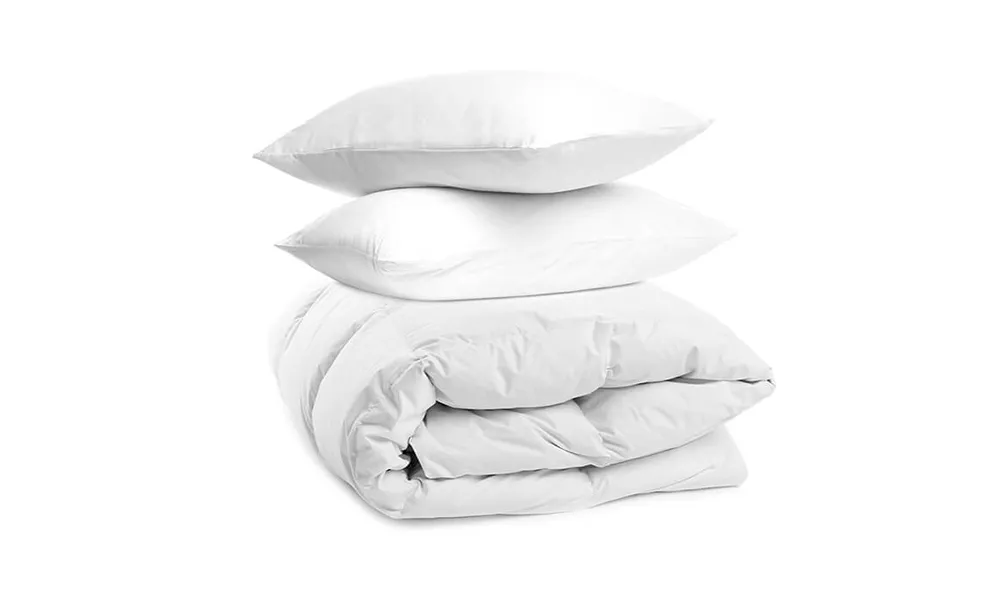 Photo of pillows and a duvet.