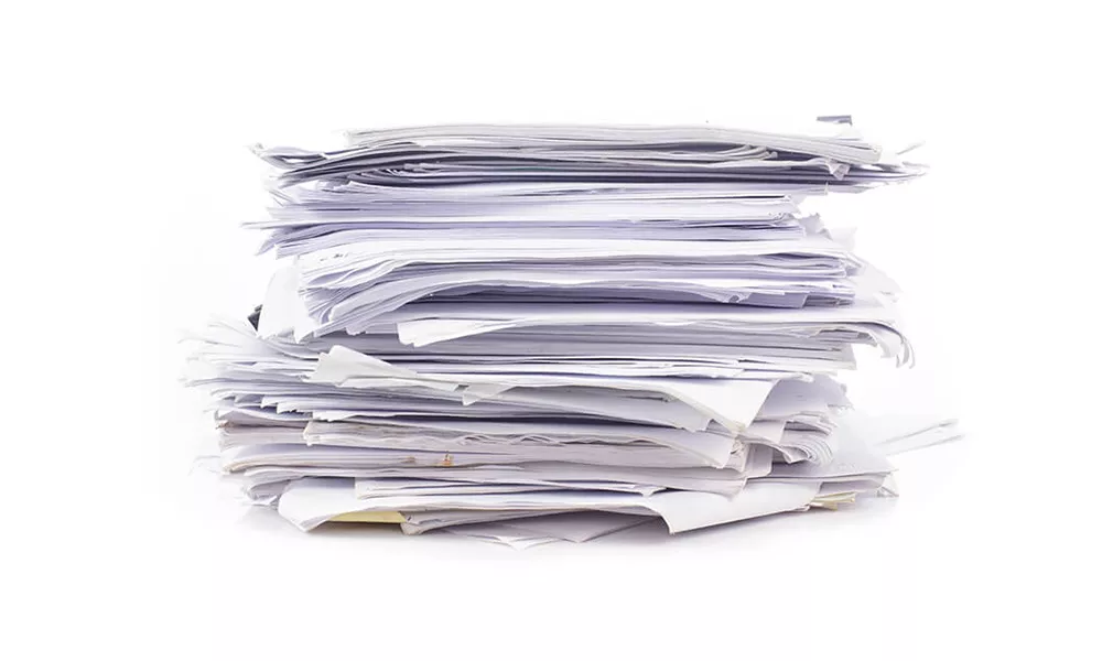 Photo of a pile of paper.