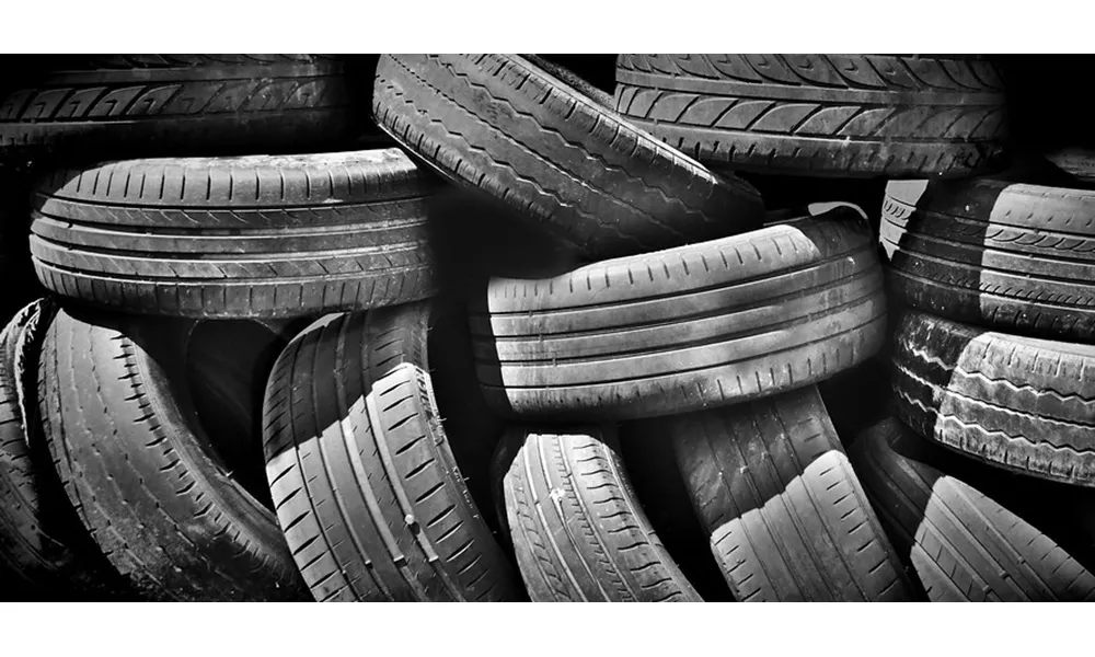 Photo of a pile of old tyres.