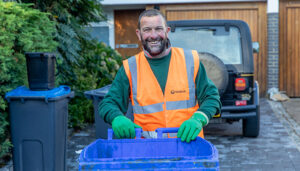 A member of the waste collection team completing his rounds in Croydon.