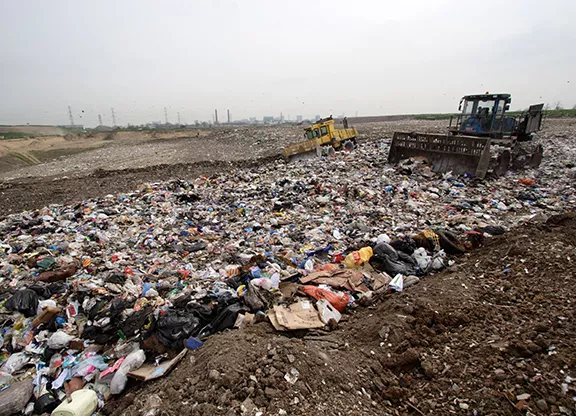 Photograph of waste being moved around the Beddington Lane landfill site in Sutton.